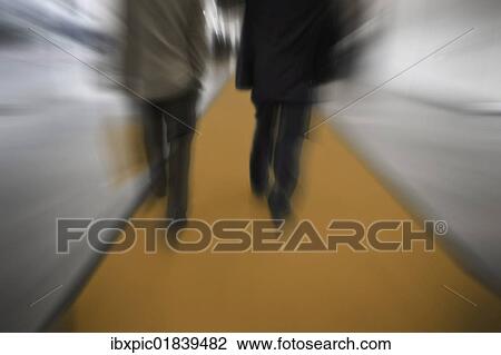 Hurrying businessmen View Large Photo Image Stock Image - Hurrying businessmen. Fotosearch