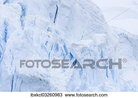 "Ice crevasses created by glacier calving, radiating blue, Lemaire Channel, Antarctic Peninsula, Antarctica" View Large Photo Image Stock Image - "Ice crevasses created by glacier calving, radiating blue, Lemaire Channel, Antarctic Peninsula, Antarctica". Fotosearch