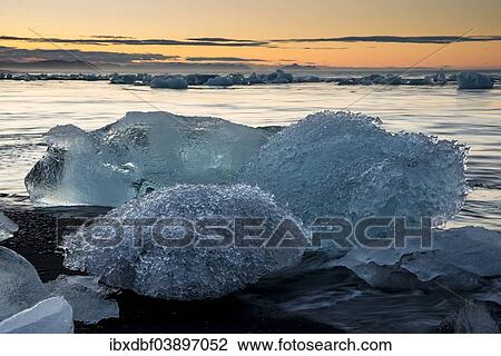 "Ice crystals on a black beach being lapped by the sea, Jokulsarlon Glacier Lagoon, Vatnajokull Glacier, Austurland, East Iceland, Iceland, Europe" View Large Photo Image Stock Image - "Ice crystals on a black beach being lapped by the sea, Jokulsarlon Glacier Lagoon, Vatnajokull Glacier, Austurland, East Iceland, Iceland, Europe". Fotosearch