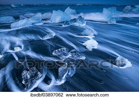 "Ice crystals on a black beach being lapped by the sea, Jokulsarlon Glacier Lagoon, Vatnajokull Glacier, Austurland, East Iceland, Iceland, Europe" View Large Photo Image Stock Image - "Ice crystals on a black beach being lapped by the sea, Jokulsarlon Glacier Lagoon, Vatnajokull Glacier, Austurland, East Iceland, Iceland, Europe". Fotosearch