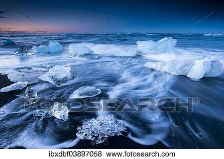 "Ice crystals on a black beach being lapped by the sea, Jokulsarlon Glacier Lagoon, Vatnajokull Glacier, Austurland, East Iceland, Iceland, Europe" View Large Photo Image Stock Photo - "Ice crystals on a black beach being lapped by the sea, Jokulsarlon Glacier Lagoon, Vatnajokull Glacier, Austurland, East Iceland, Iceland, Europe". Fotosearch