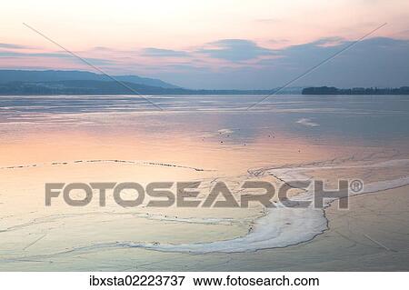 "Ice floes on Lake Constance in the evening light near Allensbach, Baden-Wuerttemberg, Germany, Europe, PublicGround, Europe" View Large Photo Image Stock Photo - "Ice floes on Lake Constance in the evening light near Allensbach, Baden-Wuerttemberg, Germany, Europe, PublicGround, Europe". Fotosearch
