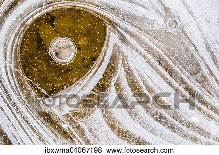 Ice structures on the water surface View Large Photo Image Stock Photo - Ice structures on the water surface. Fotosearch