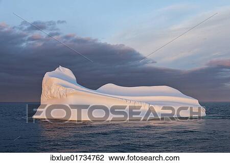 Stock Image - "Iceberg at sunset, Labrador, Canada, North America". Fotosearch