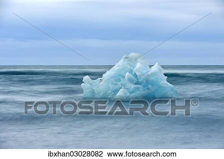 "Iceberg in the sea at the glacial lagoon of Joekulsarlon, Jokulsarlon, Iceland, Europe" View Large Photo Image Stock Image - "Iceberg in the sea at the glacial lagoon of Joekulsarlon, Jokulsarlon, Iceland, Europe". Fotosearch