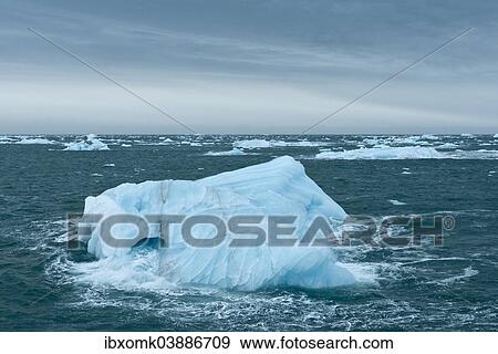 "Icebergs floating on the sea off Nordaustlandet, Svalbard Archipelago, Svalbard and Jan Mayen, Norway, Europe" View Large Photo Image Stock Photo - "Icebergs floating on the sea off Nordaustlandet, Svalbard Archipelago, Svalbard and Jan Mayen, Norway, Europe". Fotosearch