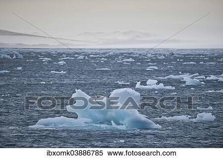 "Icebergs floating on the sea off Nordaustlandet, Svalbard Archipelago, Svalbard and Jan Mayen, Norway, Europe" View Large Photo Image Stock Photography - "Icebergs floating on the sea off Nordaustlandet, Svalbard Archipelago, Svalbard and Jan Mayen, Norway, Europe". Fotosearch