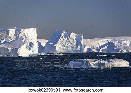 Stock Image - "Icebergs off the Antarctic Peninsula, Southern Ocean, Antarctica". Fotosearch