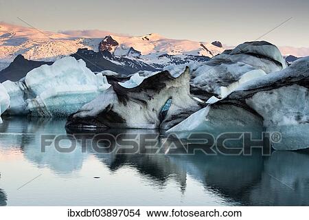 "Icebergs reflected in Jokulsarlon Glacier Lagoon, Vatnajokull Glacier, Austurland, East Iceland, Iceland, Europe" View Large Photo Image Picture - "Icebergs reflected in Jokulsarlon Glacier Lagoon, Vatnajokull Glacier, Austurland, East Iceland, Iceland, Europe". Fotosearch