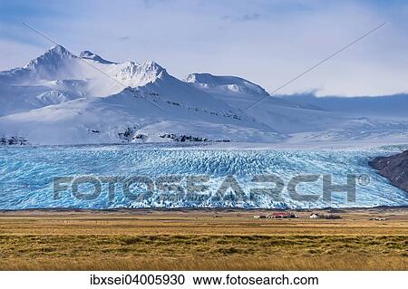 "Icelandic farmstead with glacier tongue and snow-covered mountains, Hofn, Iceland, Europe" View Large Photo Image Stock Image - "Icelandic farmstead with glacier tongue and snow-covered mountains, Hofn, Iceland, Europe". Fotosearch