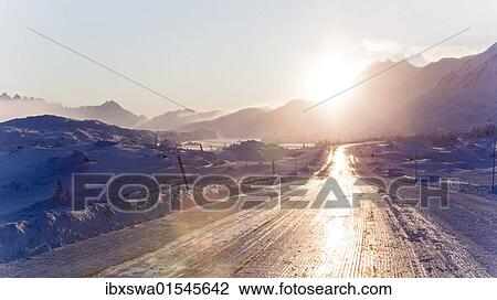 "Icy road reflecting sunlight, Coastal Range, South Klondike Highway, White Pass, connecting Skagway, Alaska, with British Columbia, B. C., Canada, North America" View Large Photo Image Stock Image - "Icy road reflecting sunlight, Coastal Range, South Klondike Highway, White Pass, connecting Skagway, Alaska, with British Columbia, B. C., Canada, North America". Fotosearch