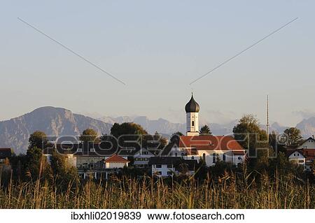 Stock Photo - "Iffeldorf, parish church of St. Vitus, Upper Bavaria, Bavaria, Germany, Europe, PublicGround, Europe". Fotosearch