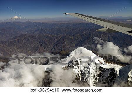 "Illimani Glacier, 6, 439 m, view from an aircraft, Departamento La Paz, Bolivia, South America" View Large Photo Image Stock Image - "Illimani Glacier, 6, 439 m, view from an aircraft, Departamento La Paz, Bolivia, South America". Fotosearch