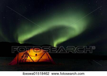 "Illuminated expedition tent and traditional wooden snow shoes, Northern Lights, Polar Lights, Aurora Borealis, green, near Whitehorse, Yukon Territory, Canada, North America" View Large Photo Image Stock Image - "Illuminated expedition tent and traditional wooden snow shoes, Northern Lights, Polar Lights, Aurora Borealis, green, near Whitehorse, Yukon Territory, Canada, North America". Fotosearch