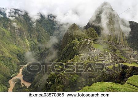 "Inca ruins at Machu Picchu, UNESCO World Heritage Site, with clouds and the Urubamba River, Urubamba Valley, Andes, Peru, South America" View Large Photo Image Stock Photograph - "Inca ruins at Machu Picchu, UNESCO World Heritage Site, with clouds and the Urubamba River, Urubamba Valley, Andes, Peru, South America". Fotosearch