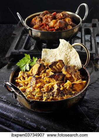 Indian Tikka Byriani chicken curry View Large Photo Image Stock Photo - Indian Tikka Byriani chicken curry. Fotosearch