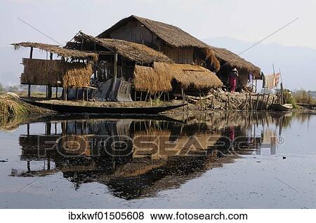 "Intha homestead on a canal near Inle Lake, Nyaung Shwe, Shan State, Myanmar, Burma, Southeast Asia, Asia" View Large Photo Image Stock Photo - "Intha homestead on a canal near Inle Lake, Nyaung Shwe, Shan State, Myanmar, Burma, Southeast Asia, Asia". Fotosearch