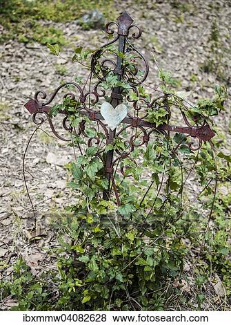 "Iron Cross with heart grave in a cemetery, France, Europe" View Large Photo Image Stock Photo - "Iron Cross with heart grave in a cemetery, France, Europe". Fotosearch