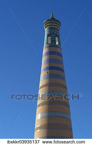 "Islom-Huja, Islom Xo'ja or Islam Haji Minaret, Itchan Kala, Khiva, Uzbekistan, Asia" View Large Photo Image Stock Photo - "Islom-Huja, Islom Xo'ja or Islam Haji Minaret, Itchan Kala, Khiva, Uzbekistan, Asia". Fotosearch
