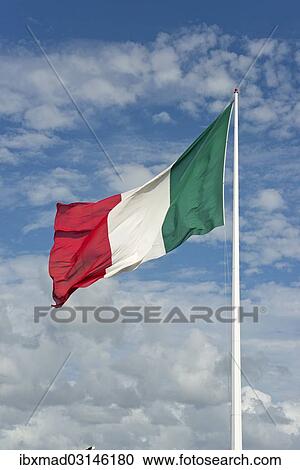 Italian flag against cloudy sky View Large Photo Image Stock Image - Italian flag against cloudy sky. Fotosearch