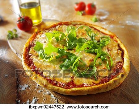 Italian pizza with rocket View Large Photo Image Stock Image - Italian pizza with rocket. Fotosearch