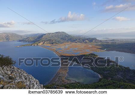 "Iztuzu beach with the Dalyan Delta and Sulungur Golu Lake, view from Mt Bozburun Tepesi, Dalyan, Mugla Province, Turkish Riviera or Turquoise Coast, Aegean, Turkey, Asia" View Large Photo Image Stock Photo - "Iztuzu beach with the Dalyan Delta and Sulungur Golu Lake, view from Mt Bozburun Tepesi, Dalyan, Mugla Province, Turkish Riviera or Turquoise Coast, Aegean, Turkey, Asia". Fotosearch