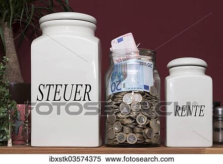 Stock Photography - "Jar containing money and jars with the signs """"Steuer"""" and """"Rente"""", German for """"taxes"""" and """"pensions"""", on a kitchen shelf, Germany, Europe". Fotosearch