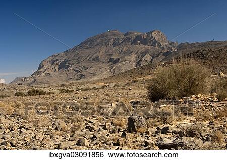 Stock Photograph - "Jebel Harim with a radar station, the highest mountain on the Musandam Peninsula, Musandam Governorate, Oman, Asia". Fotosearch
