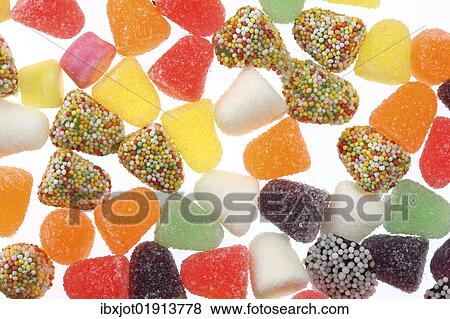 "Jelly and fruit gum cones, some with pearl sugar coating" View Large Photo Image Stock Photo - "Jelly and fruit gum cones, some with pearl sugar coating". Fotosearch