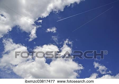 "Jet with contrails on cloudy sky, Germany, Europe" View Large Photo Image Stock Photo - "Jet with contrails on cloudy sky, Germany, Europe". Fotosearch