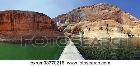 "Jetty and red Navajo sandstone cliffs, rock formations rising from Lake Powell, Page, Arizona, USA" View Large Photo Image Stock Photograph - "Jetty and red Navajo sandstone cliffs, rock formations rising from Lake Powell, Page, Arizona, USA". Fotosearch