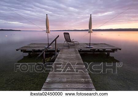 "Jetty, early morning at the autumnal Lake Starnberg near Seeshaupt, Bavaria, Germany, Europe, PublicGround, Europe" View Large Photo Image Stock Image - "Jetty, early morning at the autumnal Lake Starnberg near Seeshaupt, Bavaria, Germany, Europe, PublicGround, Europe". Fotosearch