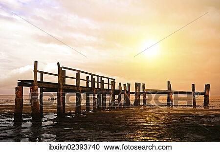 Jetty in the evening light View Large Photo Image Stock Image - Jetty in the evening light. Fotosearch