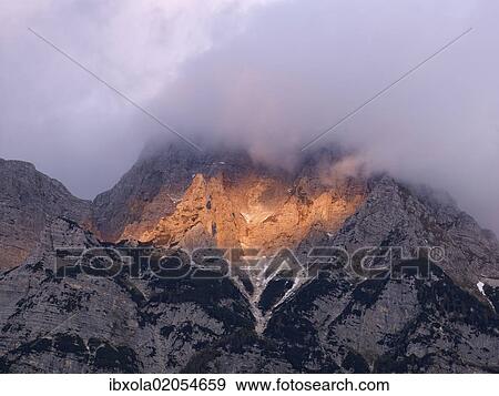 "Julian Alps at dusk near Bovec, Triglav National Park, Slovenia, Europe" View Large Photo Image Stock Photo - "Julian Alps at dusk near Bovec, Triglav National Park, Slovenia, Europe". Fotosearch