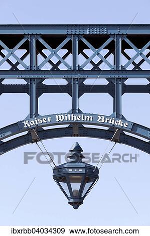 Stock Photo - "Kaiser Wilhelm Bridge, historic swing bridge from 1907 in the harbour, Wilhelmshaven, Lower Saxony, Germany, Europe". Fotosearch