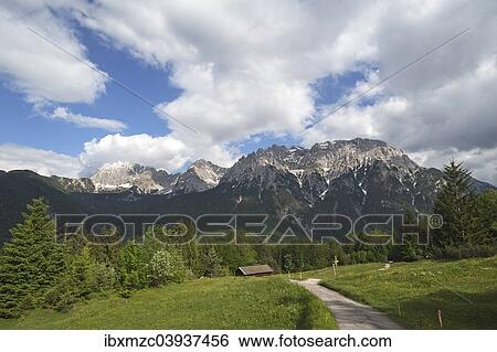 "Karwendel mountain range, hiking trail at the front, Mittenwald, Bavaria, Germany, Europe" View Large Photo Image Stock Photograph - "Karwendel mountain range, hiking trail at the front, Mittenwald, Bavaria, Germany, Europe". Fotosearch