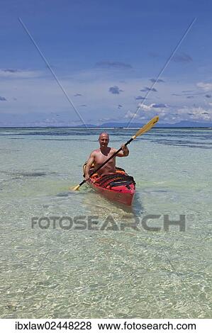 "Kayaker, La Digue Island, Seychelles, Africa, Indian Ocean, Africa" View Large Photo Image Stock Photo - "Kayaker, La Digue Island, Seychelles, Africa, Indian Ocean, Africa". Fotosearch