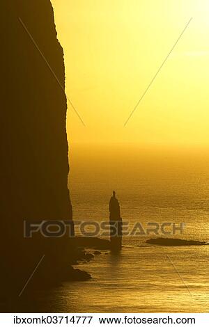"Kellingin sea stack, petrified troll according to legend, at sunset, Eioi, Eysturoy, Faroe Islands, Denmark, Europe" View Large Photo Image Stock Photo - "Kellingin sea stack, petrified troll according to legend, at sunset, Eioi, Eysturoy, Faroe Islands, Denmark, Europe". Fotosearch