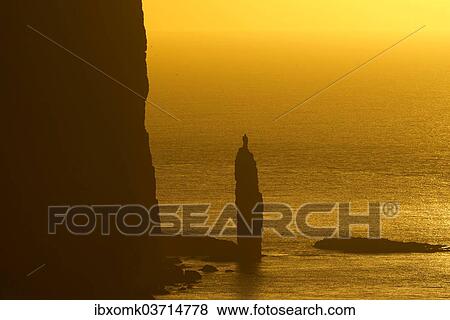 "Kellingin sea stack, petrified troll according to legend, at sunset, Eioi, Eysturoy, Faroe Islands, Denmark, Europe" View Large Photo Image Stock Photo - "Kellingin sea stack, petrified troll according to legend, at sunset, Eioi, Eysturoy, Faroe Islands, Denmark, Europe". Fotosearch