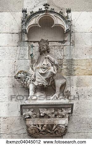 "King Nepukadnezar riding a lion, 14th century, main facade of the Cathedral of Regensburg, Regensburg, Upper Palatinate, Bavaria, Germany, Europe" View Large Photo Image Stock Image - "King Nepukadnezar riding a lion, 14th century, main facade of the Cathedral of Regensburg, Regensburg, Upper Palatinate, Bavaria, Germany, Europe". Fotosearch