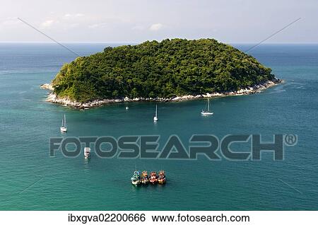 "Ko Man or Mun Island off the southern coast of the island of Phuket, Thailand, Asia" View Large Photo Image Stock Photograph - "Ko Man or Mun Island off the southern coast of the island of Phuket, Thailand, Asia". Fotosearch