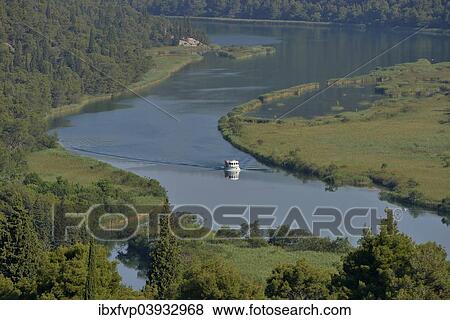 "Krka River with an excursion boat, Krka National Park, Sibenik-Knin County, Dalmatia, Croatia, Europe" View Large Photo Image Stock Photo - "Krka River with an excursion boat, Krka National Park, Sibenik-Knin County, Dalmatia, Croatia, Europe". Fotosearch