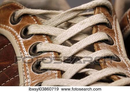 Laces of a leather shoe View Large Photo Image Stock Photo - Laces of a leather shoe. Fotosearch