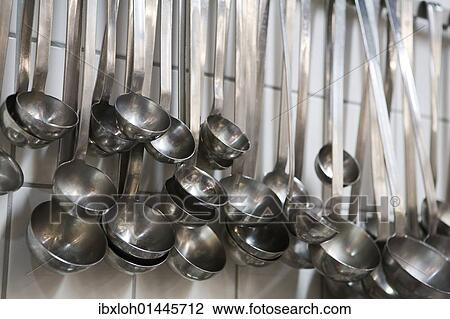 Ladles in a commercial kitchen View Large Photo Image Stock Image - Ladles in a commercial kitchen. Fotosearch