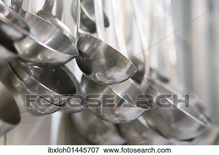Ladles in a commercial kitchen View Large Photo Image Stock Photo - Ladles in a commercial kitchen. Fotosearch