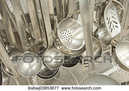 "Ladles, slotted spoon, kitchen tools in an industrial kitchen, Germany, Europe" View Large Photo Image Stock Photo - "Ladles, slotted spoon, kitchen tools in an industrial kitchen, Germany, Europe". Fotosearch