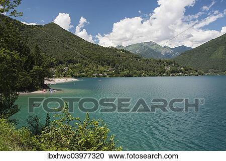 Stock Image - "Lago di Ledro and Lake Ledro, Ledro, Trentino-Alto Adige, Italy, Europe". Fotosearch