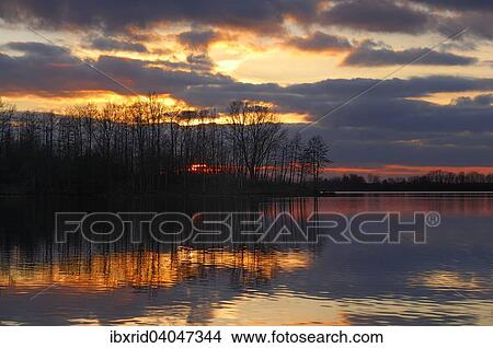 "Lake at dusk, sunset, Alpen-Menzelen, North Rhine-Westphalia, Germany, Europe" View Large Photo Image Picture - "Lake at dusk, sunset, Alpen-Menzelen, North Rhine-Westphalia, Germany, Europe". Fotosearch