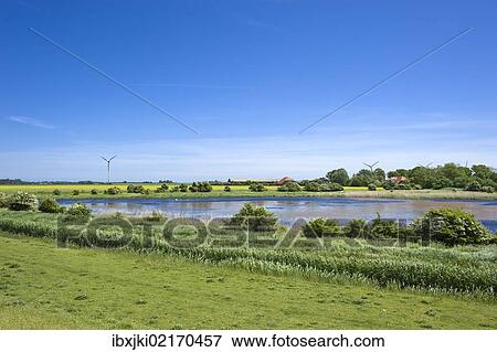 Stock Photo - "Lake at the flood dyke, Westermarkelsdorf, Island of Fehmarn, Baltic Sea, Schleswig-Holstein, Germany, Europe". Fotosearch
