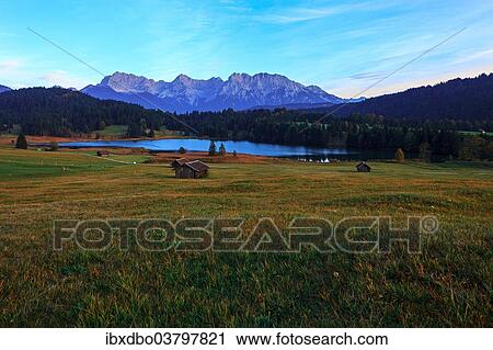 Stock Image - "Lake Geroldsee or Wagenbruchsee, dusk, Gerold, Krun, Bavaria, Germany, Europe". Fotosearch
